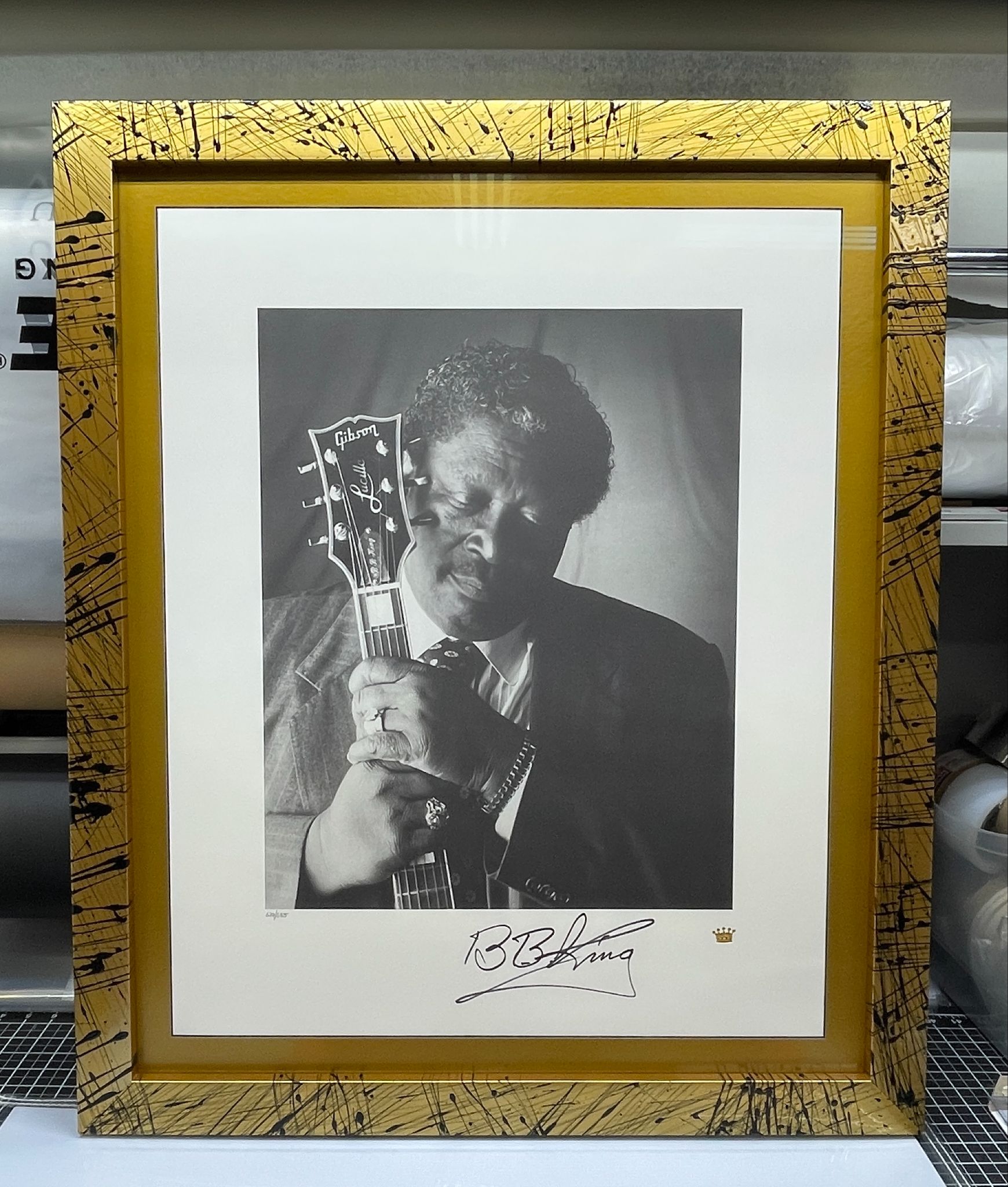 B.B. King portrait in a custom gold splatter frame built by Villa